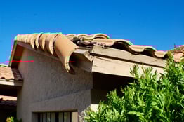 damage-to-roof-on-house-from-storm-2021-10-21-02-47-36-utc
