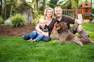 Happy Family with Dog Outside