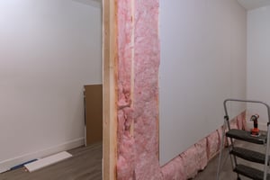 screwing-drywall-on-beams-framing-after-installing-2022-09-19-17-19-16-utc